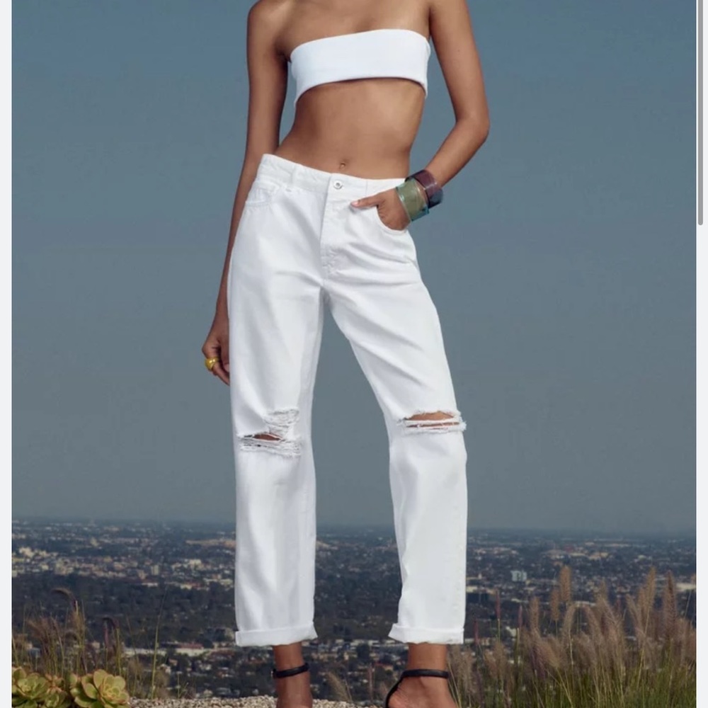 White side leg Zara jeans ripped never worn